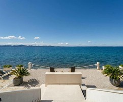 Mediterranean villa in the first row by the sea
