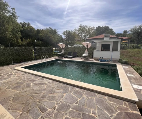 Modern single-story home with a pool for sale in Brtonigla in Croatia