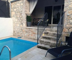 Istria, Poreč – Renovated stone terraced house with pool for sale