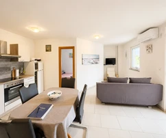 Apartment and studio with garden and pool for sale