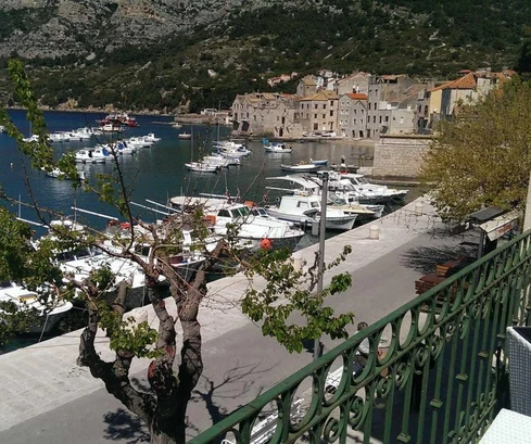 Mixed-use residential and commercial building for sale in Komiža right by the sea in Croatia