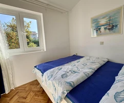 Středomořský dům s byty na prodej v Malinské v Chorvatsku