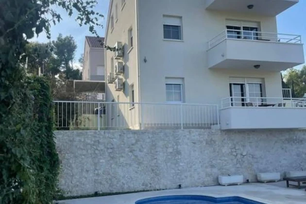 Duplex apartment for sale with a pool and sea view in Croatia