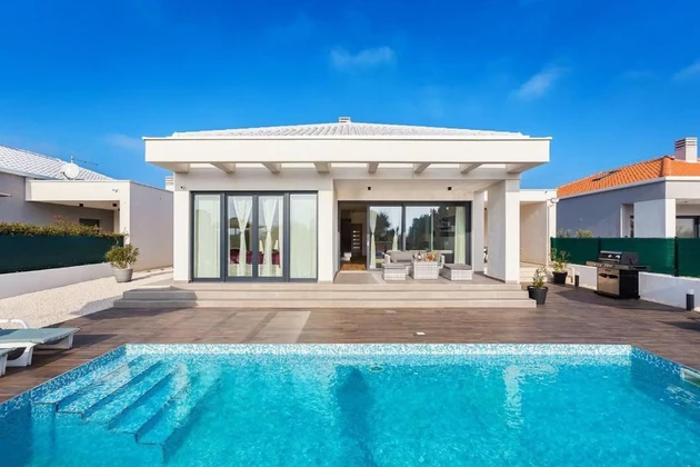 Modern single-story home with a pool for sale in Pula in Croatia