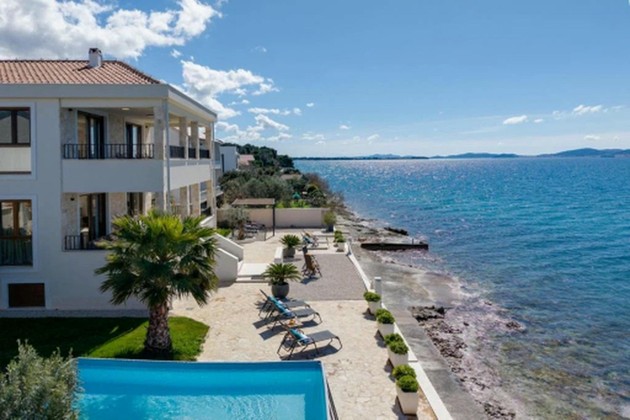 Mediterranean villa in the first row by the sea