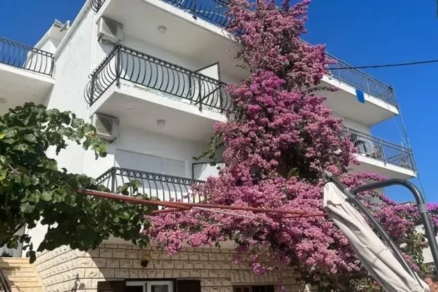 Trogir, Saldun, semi-detached house 430m2, garage, first row to the sea, 20 m from the beach