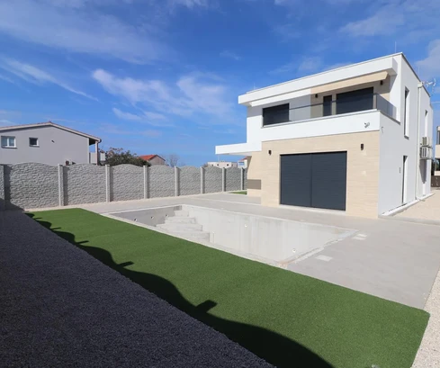 Maison individuelle avec piscine - vue sur la mer - en construction