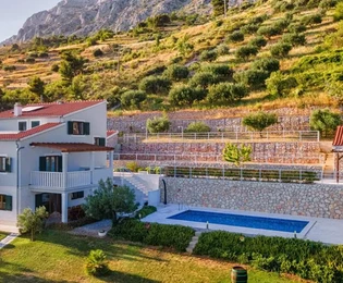 Stone sea view house in Omis