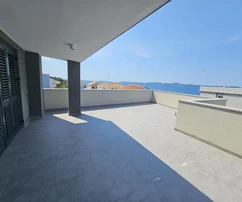 Attico a Kožino con accesso privato al mare