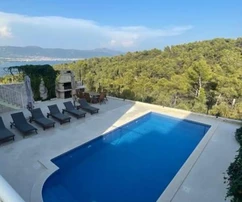 Duplex apartment for sale with a pool and sea view in Croatia