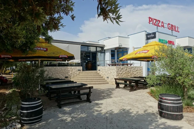 Zaton commercial-residential building in a busy location