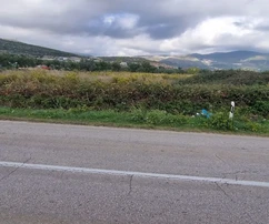 Trogir, Divulje, terreno agrícola de 3314 m2, junto a la carretera principal hacia el aeropuerto