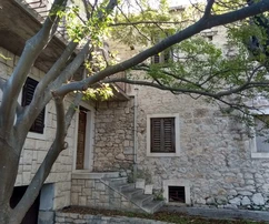 Stone house for sale right on the waterfront in Sutivan in Croatia