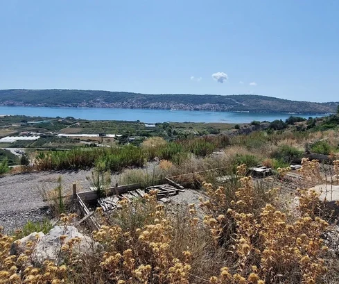 Trogir, Plano, agricultural land 3296 m2, sea view, road