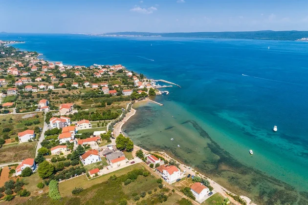 Comfortable beachfront apartments in a quiet island setting