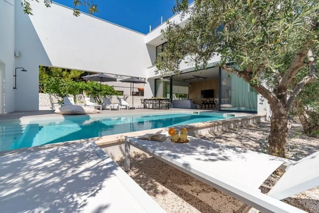 Modern villa for sale on Brač just steps from the sea in Croatia
