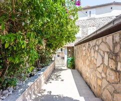 Charming old stone house with apartments and a restaurant for sale in Supetar in Croatia