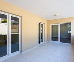 Comfortable apartment for sale right on the seafront in Okrug in Croatia