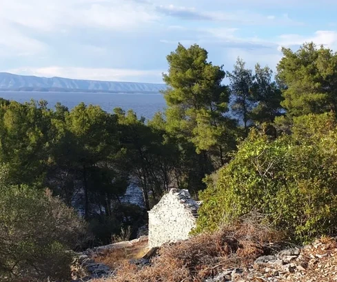 Korčula, Vela Luka, building plot 1964 m2, first row to the sea