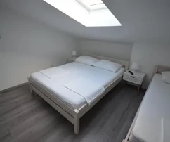 Appartement trois pièces deuxième étage 127,33m2