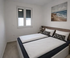 Luxuslakás tetőterasszal, 50 m-re a tengertől, panorámás kilátással Zadarra és a szigetekre
