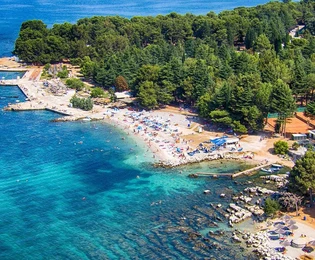 BAULAND 100 M VOM MEER UND 2 KM VOM ZENTRUM VON POREČ ENTFERNT - FÜR DEN BAU EINES HOTELS