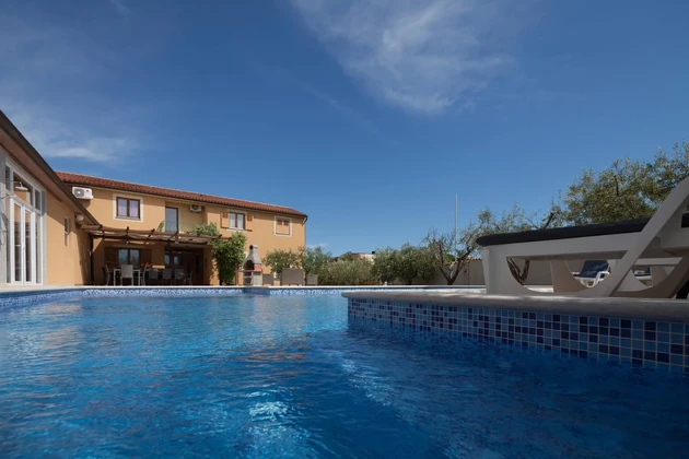 Apartment building with a hall for sale in Medulin in Croatia