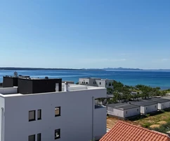 (S2) Modern luxury with garden - second row from the sea and sea view