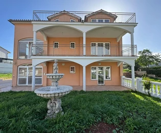 Spacious home for sale featuring three apartments near the sea in Croatia