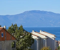 Two-level apartment with a pool for sale in Malinska in Croatia