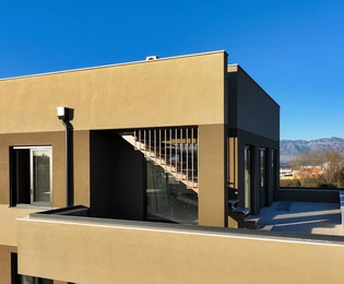 Penthouse with roof terrace and sea view