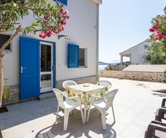 Charming two-story stone home for sale right on the waterfront in Croatia