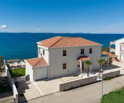 Mediterranean villa in the first row by the sea