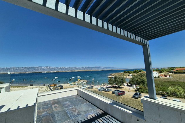Modern villa on the island of Vir with two pools and sea views, just 50 meters from the beach