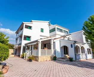 Apartment building with pool for sale in Marina in Croatia