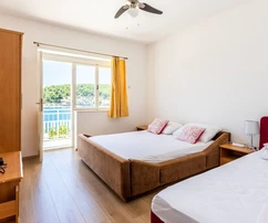 Spacious apartment building for sale in Drvenik, directly on the waterfront in Croatia