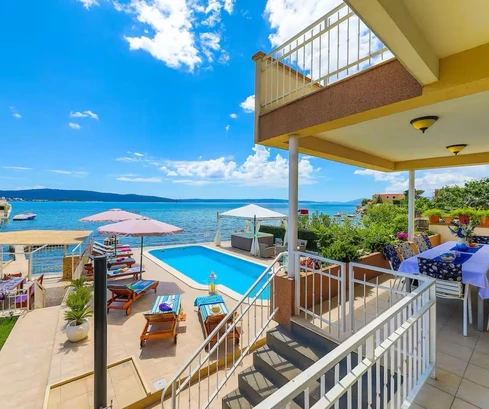Waterfront home with a pool for sale in Kaštela in Croatia