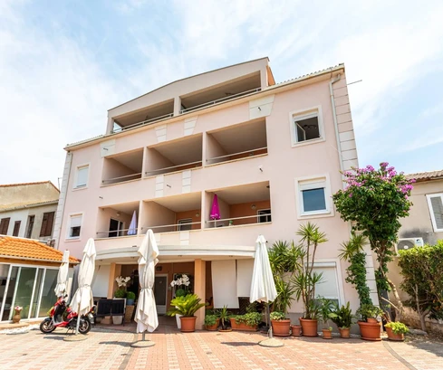 House with apartments for sale in the center of Novalja in Croatia