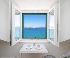 Stone house for sale right on the waterfront in Krapanj in Croatia