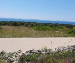 Agricultural land 7168 m², asphalt access. Sea view.