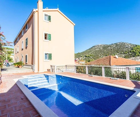 Home with apartments and a pool for sale in Marina in Croatia