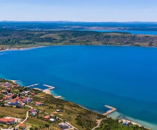 Pozemek Rtina 55 eur za m²