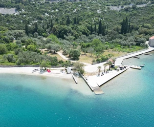 Каменный дом на продажу в Слано в нескольких шагах от моря в Хорватии