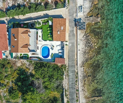 Seaside villa for sale in a prime waterfront location on Drvenik Island in Croatia