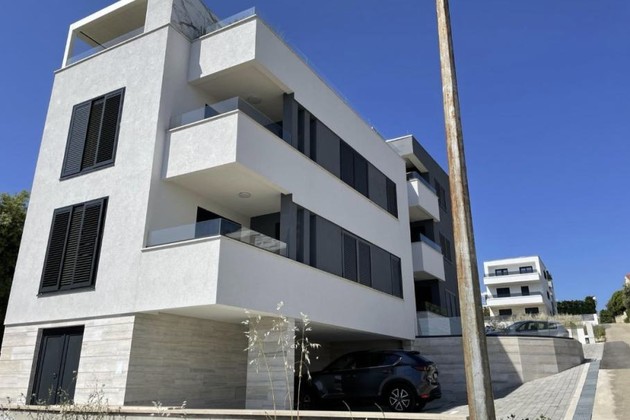 Apartment for sale by the sea with a garden and panoramic views in Croatia