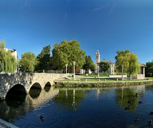 Versatile Commercial Space with Large Yard in Solin for Sale